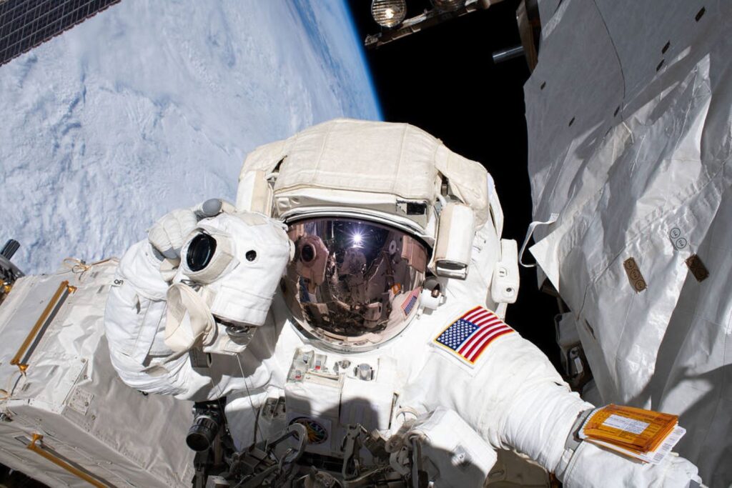 Spacewalker Andrew Morgan prepares to take a photograph. NASA